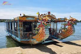 private car and dragon boat on the Perfume river